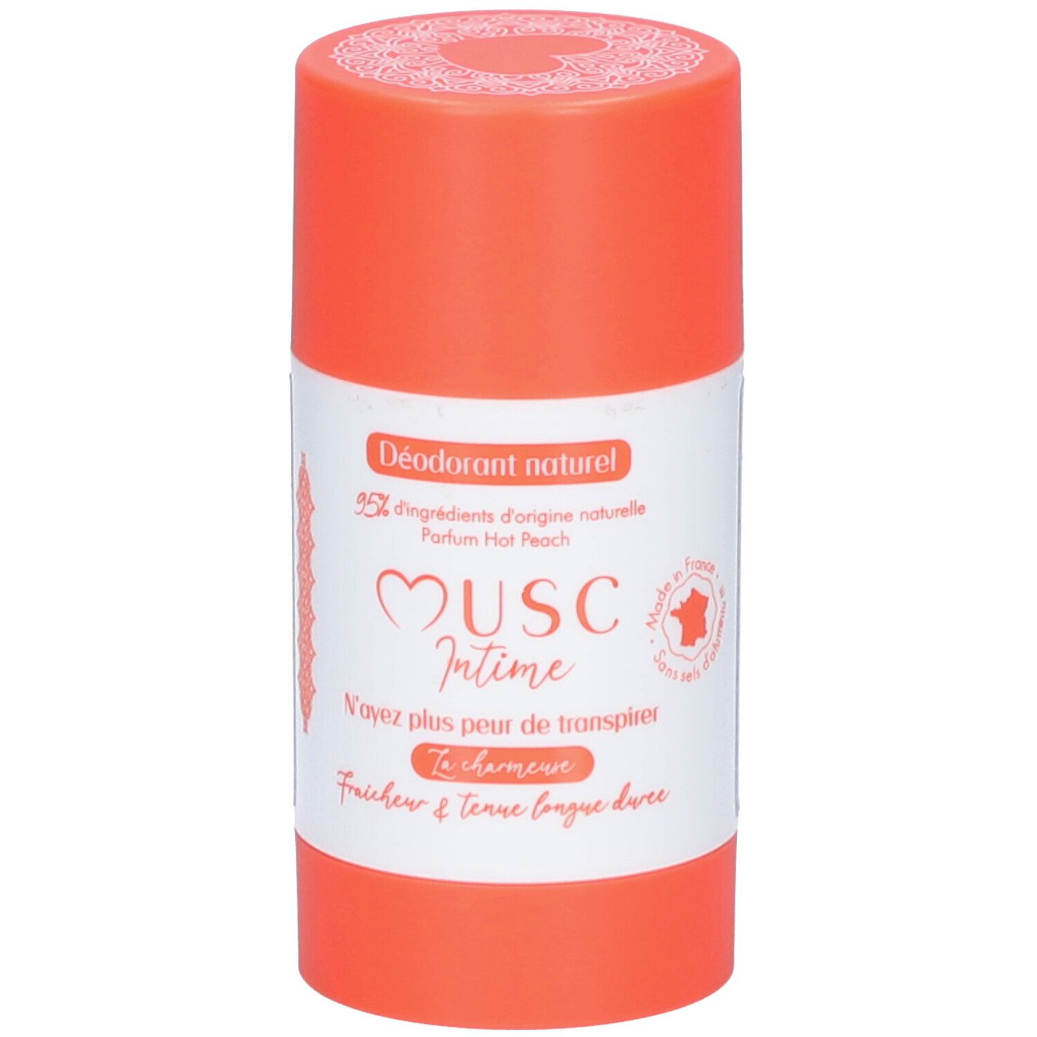 Deodorant-Stick. Orangefarbener Behälter mit weißem Etikett. Text: Musc Intime, Hot Peach. Französische Beschriftung.