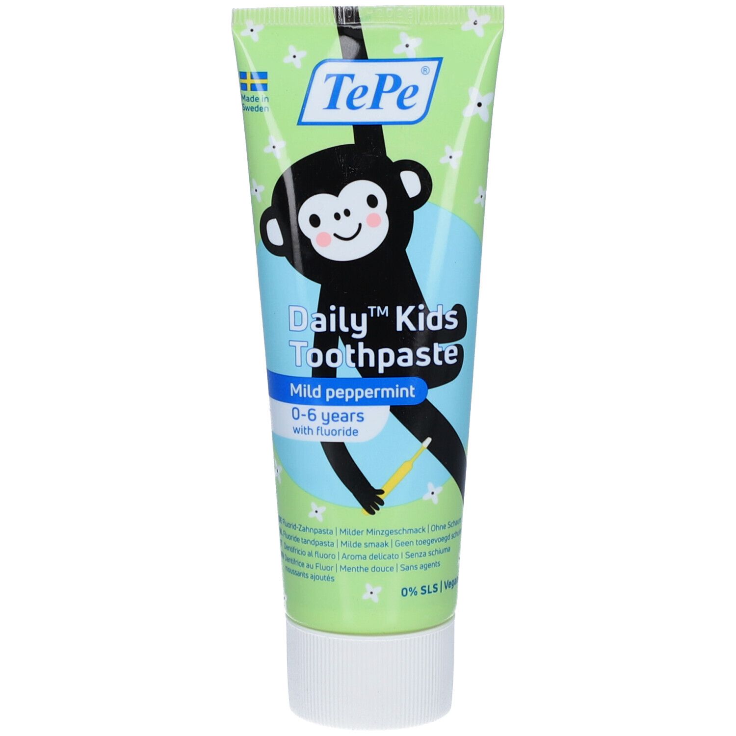 Tube de dentifrice avec illustration de singe. Texte: Daily Kids Toothpaste, 0-6 ans, Menthe douce. Design vert et blanc.
