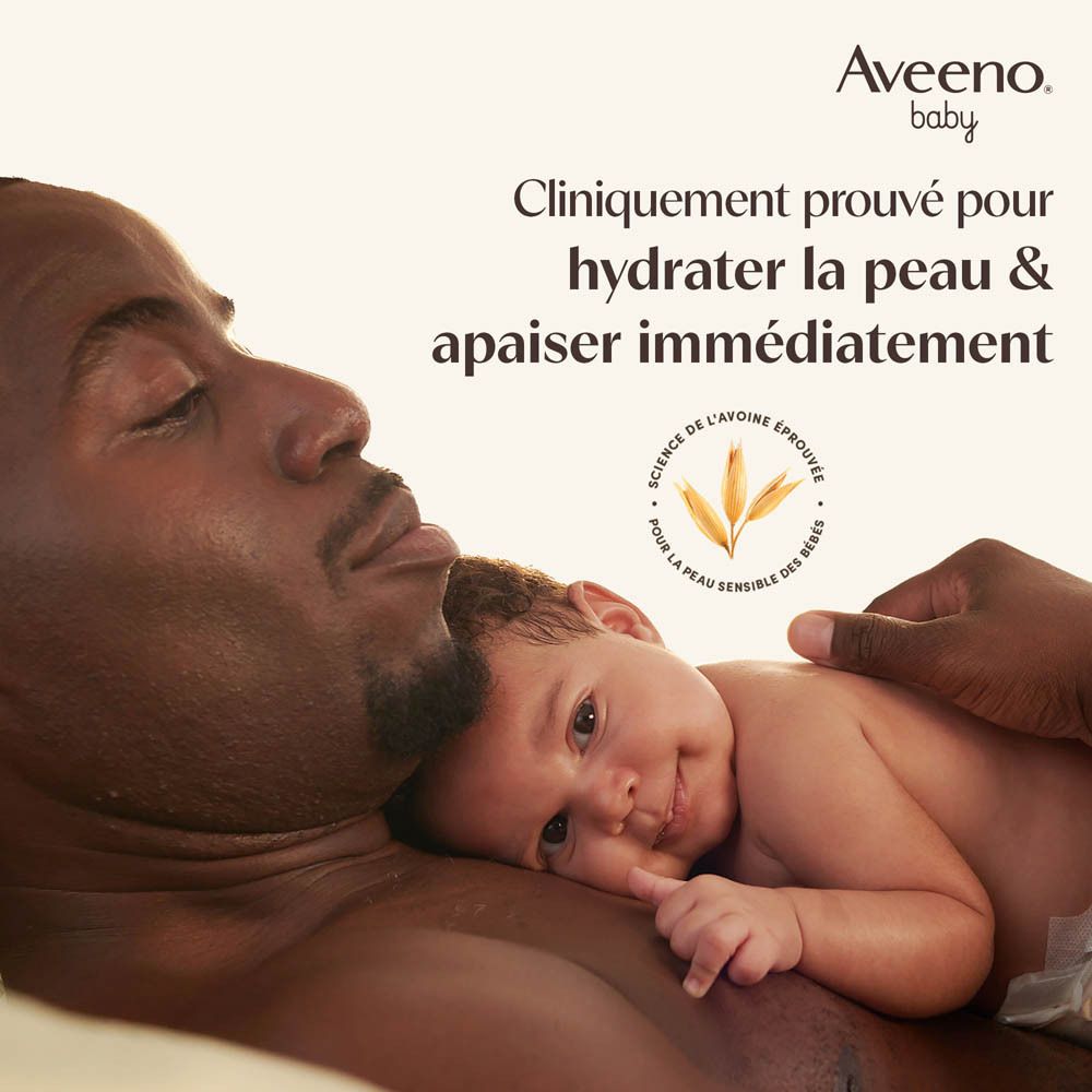 Père et bébé. Bébé sur la poitrine du père. Texte: Cliniquement prouvé.