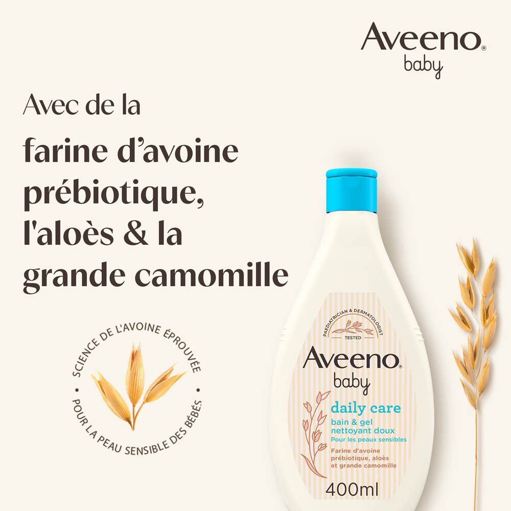 Flacon Aveeno Baby Daily Care et épis d'avoine. Texte: Avec de la farine d'avoine prébiotique, l'aloès & la grande camomille.