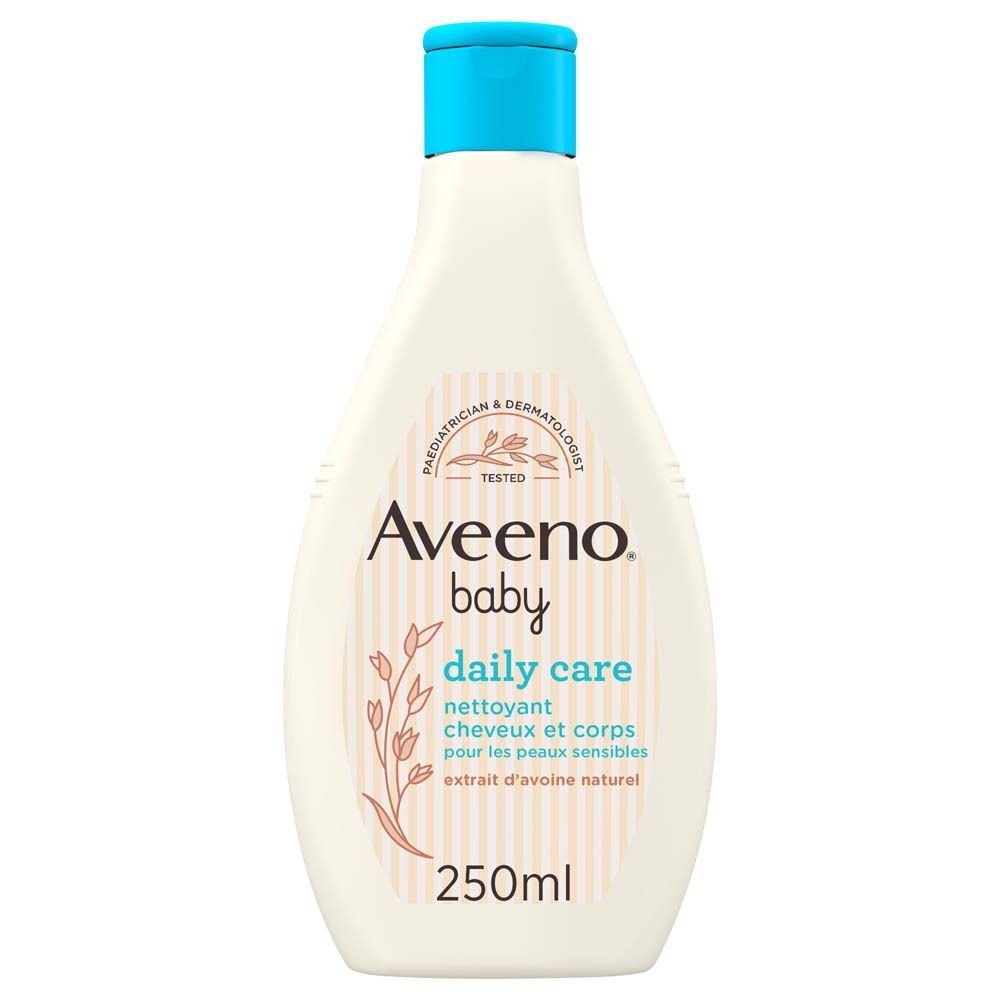 Flacon beige à bouchon bleu. Inscription: Aveeno baby daily care. Pour peaux sensibles. 250ml.
