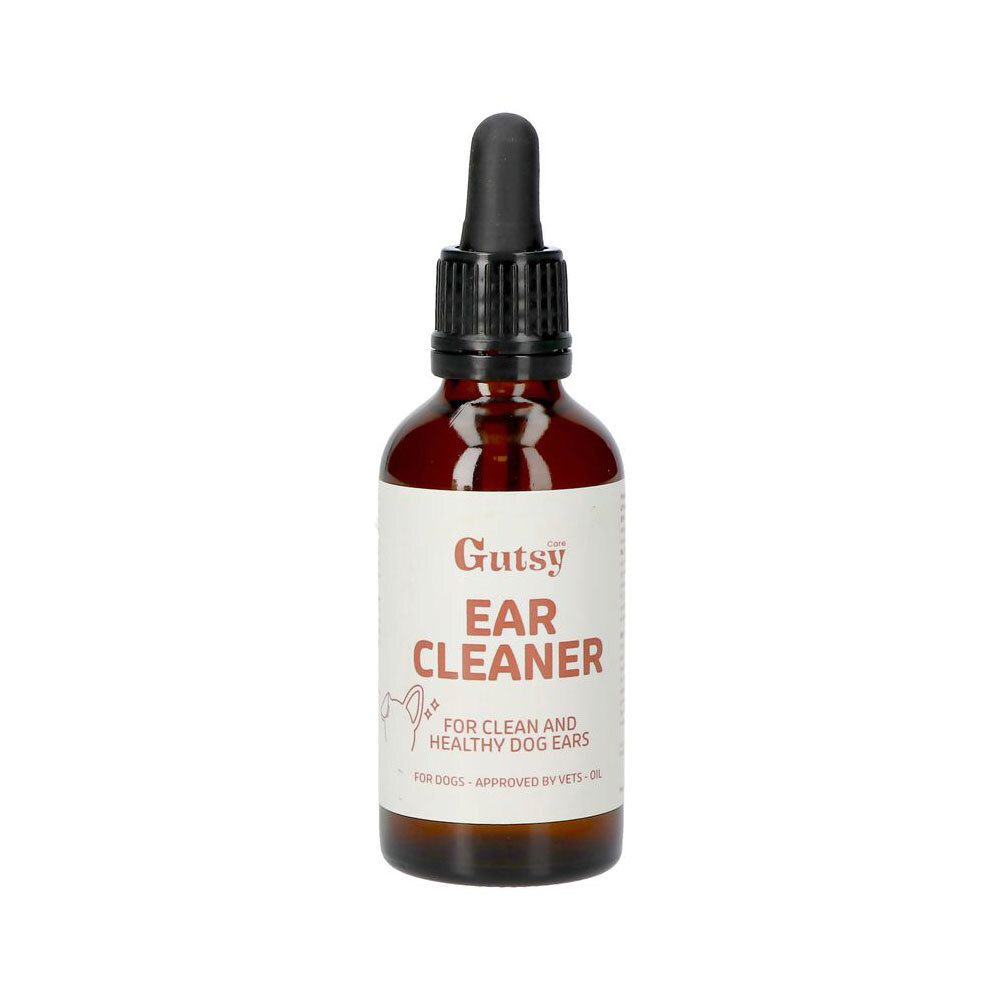Flacon en verre brun avec bouchon noir et pipette. Étiquette "Gutsy Ear Cleaner" pour oreilles de chien.