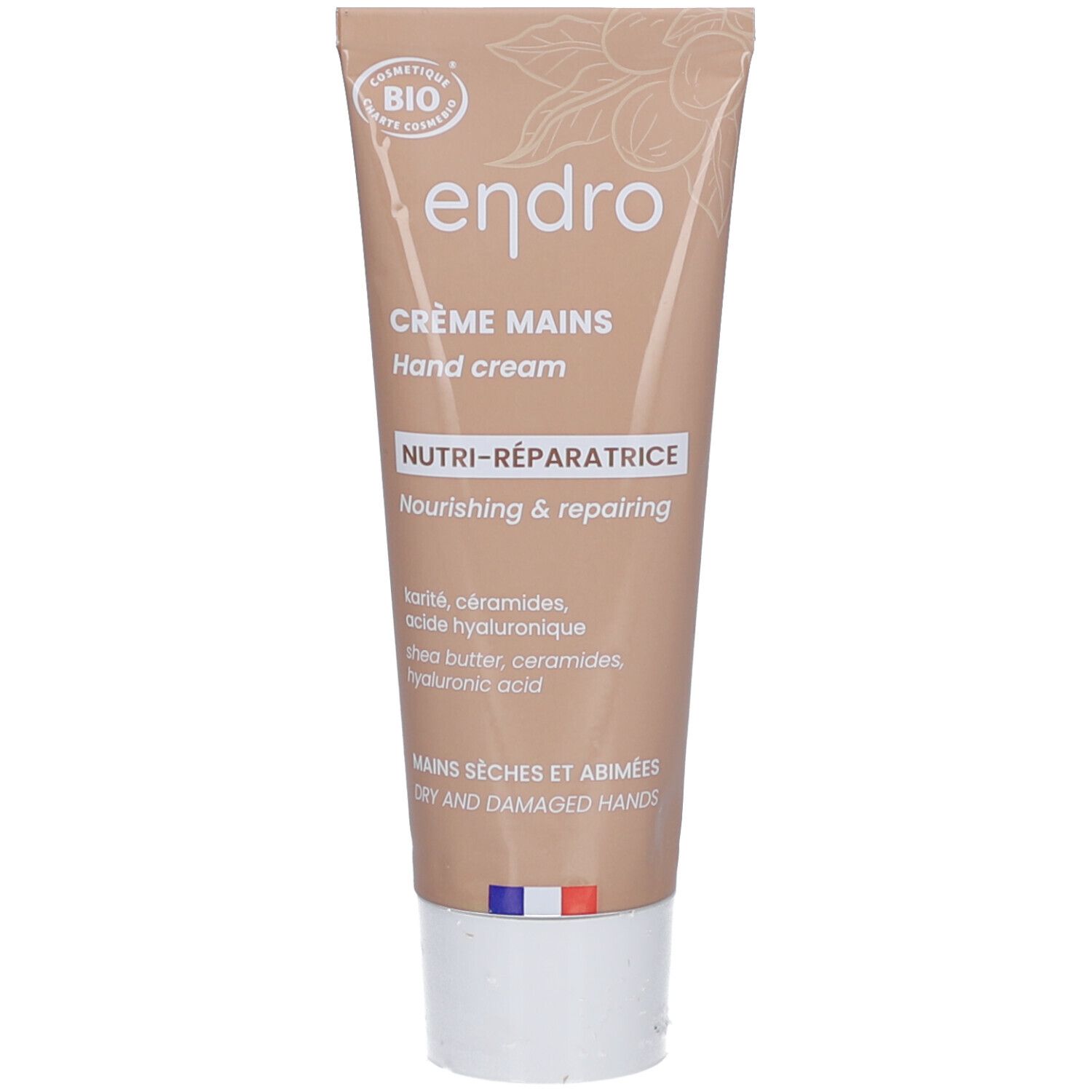 Beige Tube Handcreme. Aufschrift: endro, Crème Mains, Nutri-Réparatrice, Hand Cream. Bio-Siegel. Französische Flagge.