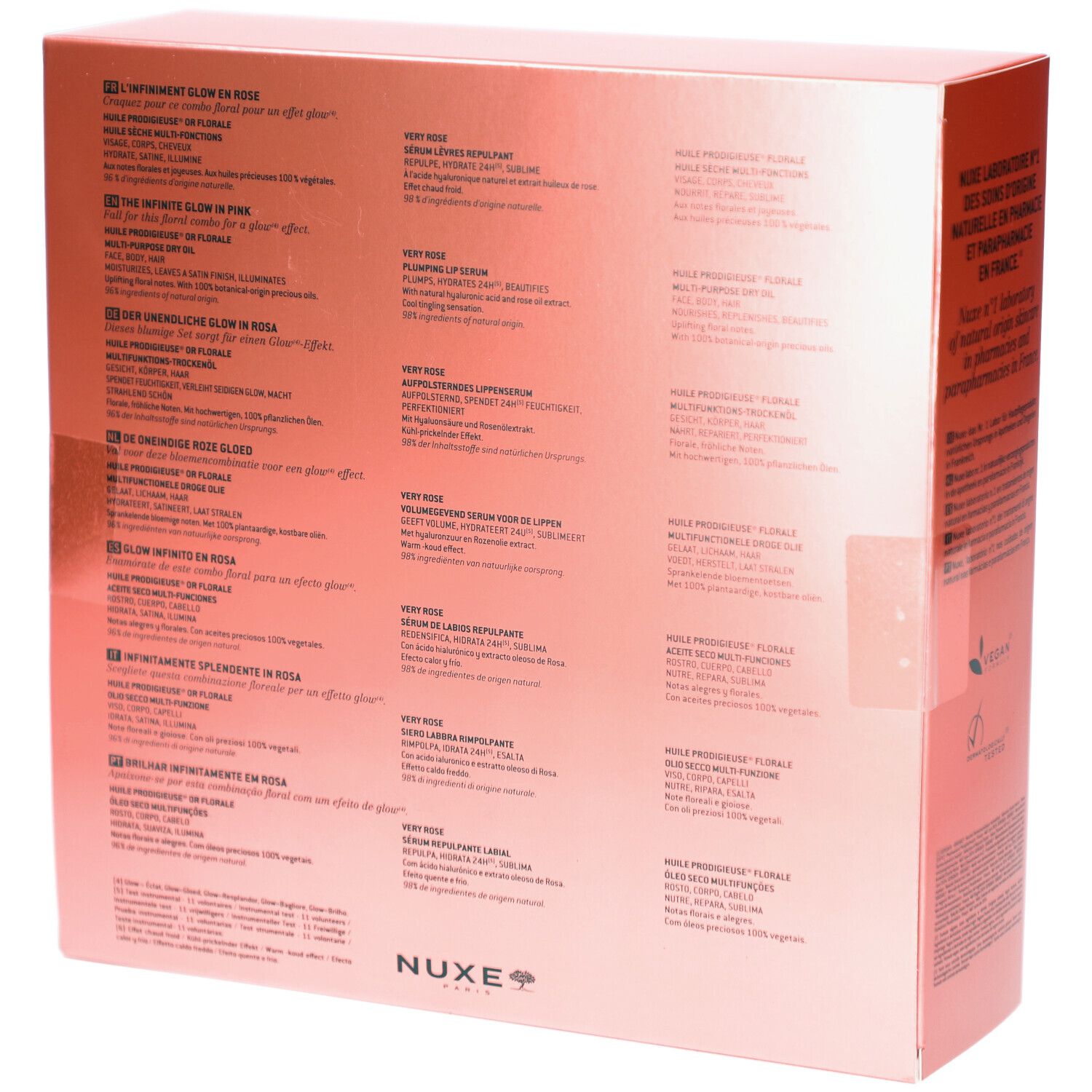Rückseite der rosa Geschenkbox. Text in mehreren Sprachen. Logo: Nuxe Paris. Text: L'Infiniement Glow en Rose, 100% vegetabil.