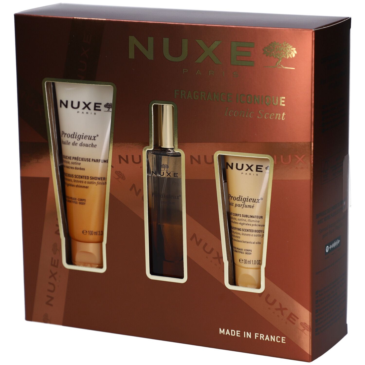 Coffret cadeau avec trois produits. Comprend un gel douche, un parfum et une lotion pour le corps. Emballage en boîte marron avec des accents dorés.