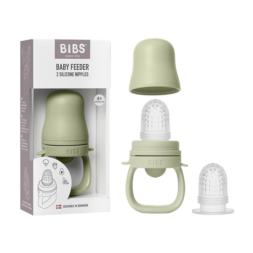 BIBS Baby Feeder et composants. Alimentateur en silicone vert clair, couvercle et deux tétines en silicone. Avec poignées.