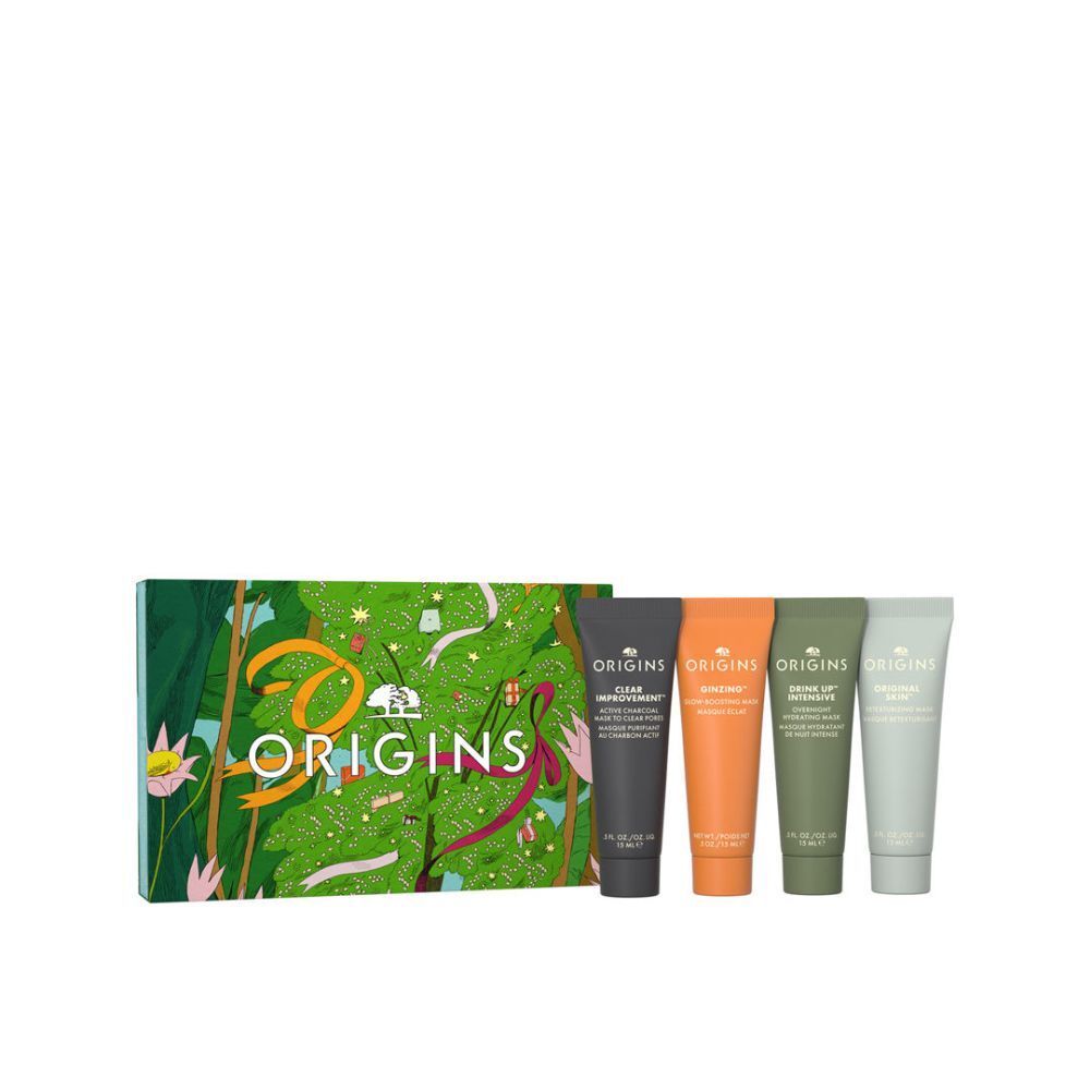 Coffret Origins avec 5 tubes. Emballage vert imprimé avec logo. Tubes noirs, orange, vert et vert clair.