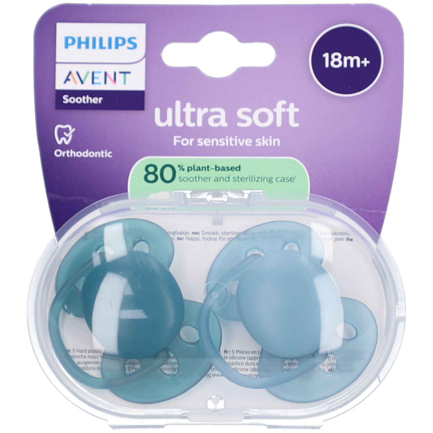 Zwei blaue Schnuller in einer transparenten, ovalen Aufbewahrungsbox. Verpackung mit Philips Avent Logo und 'ultra soft'.