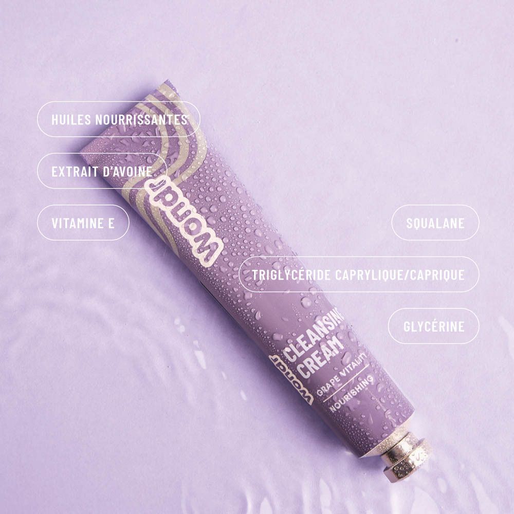 Tube violet avec étiquettes d'ingrédients: "Huiles nourrissantes", "Extrait d'avoine", "Vitamine E", "Squalane", etc. Sur fond violet.