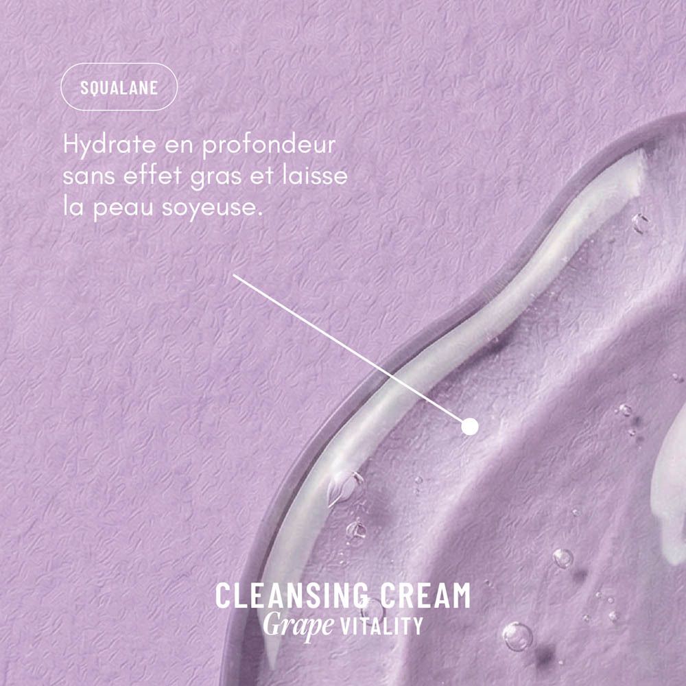 Gros plan de la crème. Texte: "Squalane" et description. Sur fond violet.