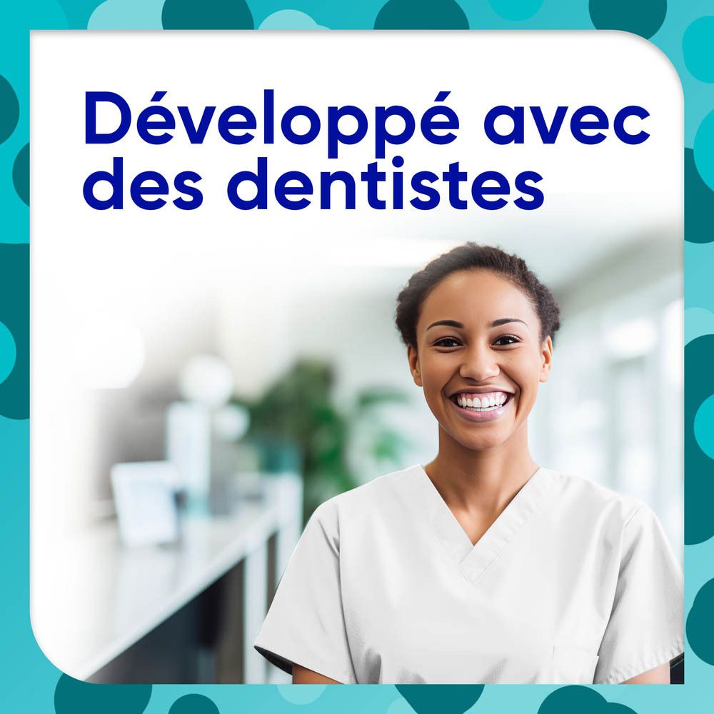 Photo d'une femme souriante en blanc. Texte : Développé avec des dentistes.