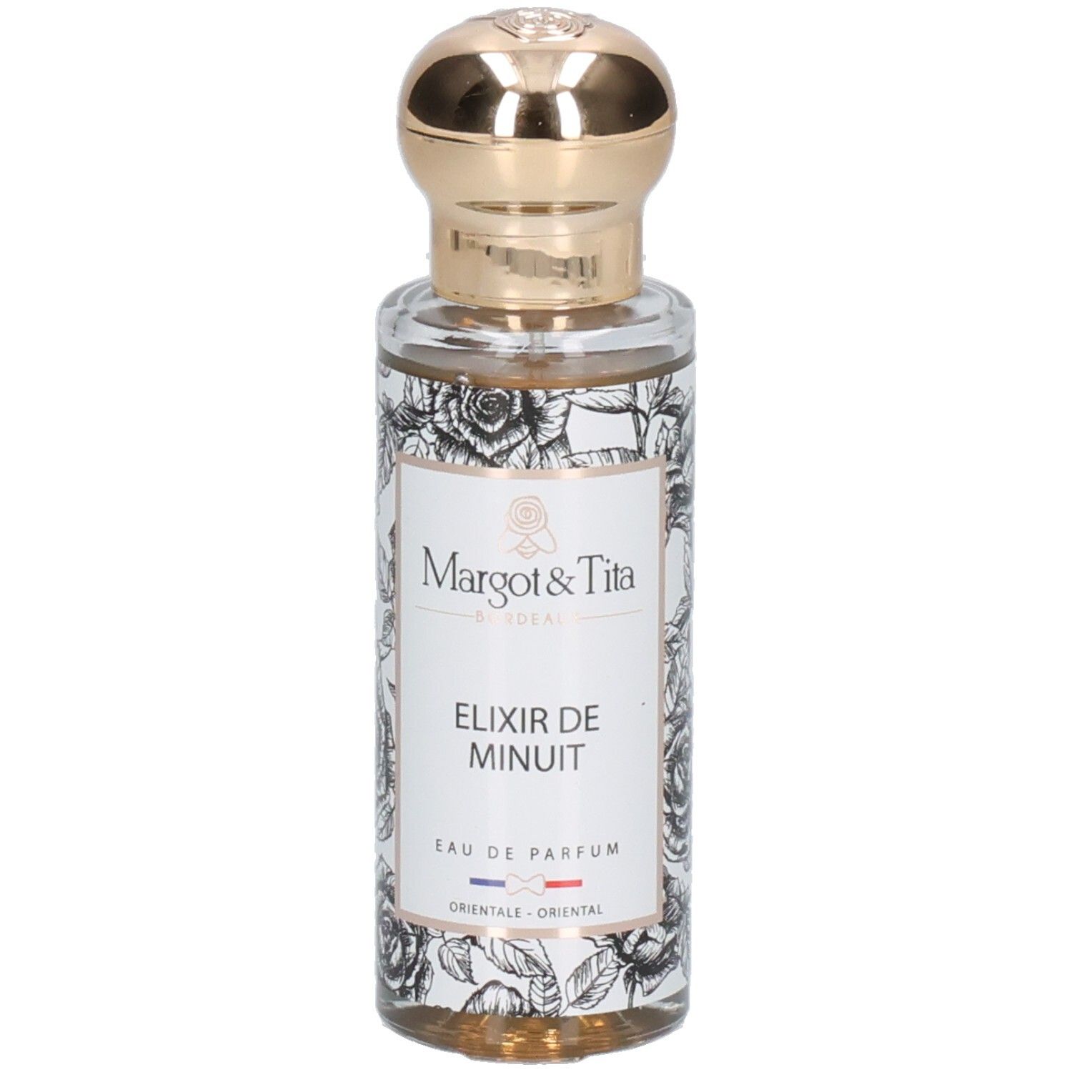 Margot & Tita Elixir de Minuit Eau de Parfum Flasche mit floralem Muster und goldenem Verschluss.