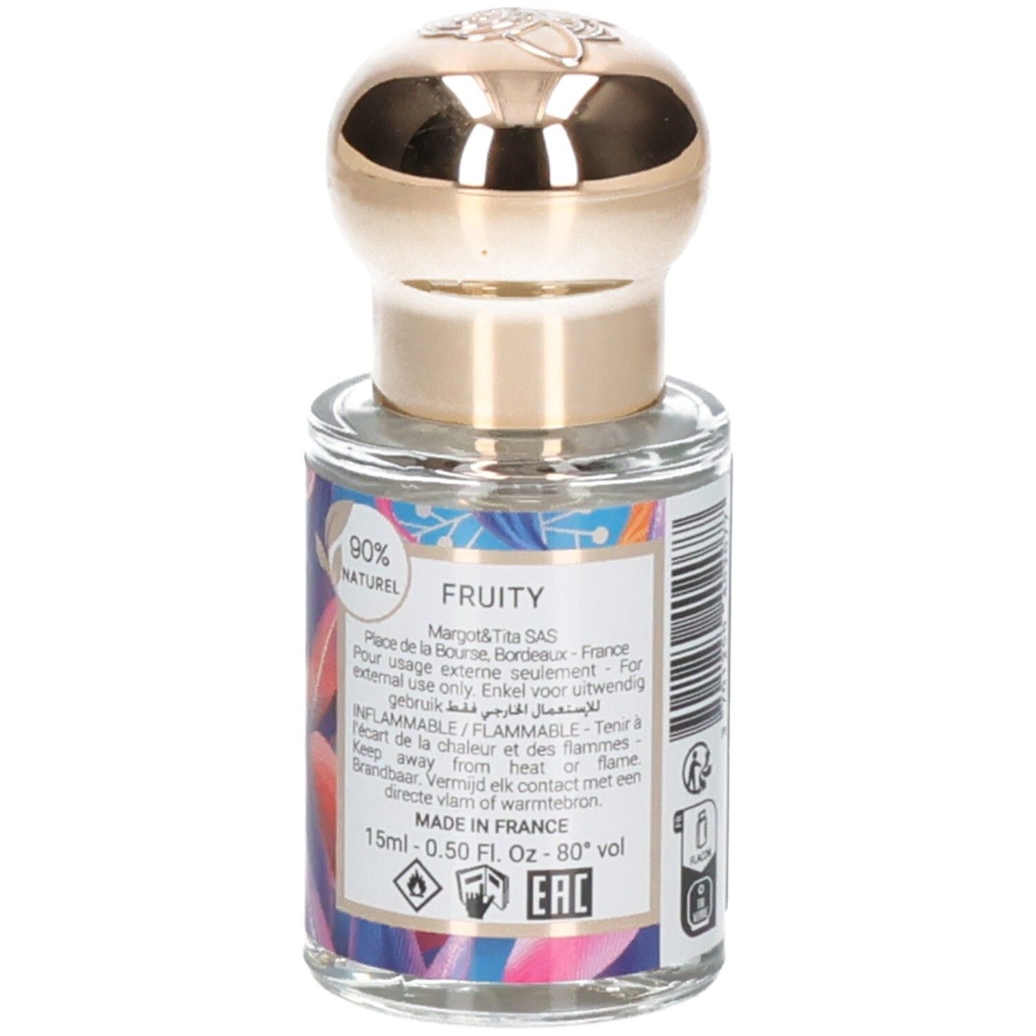 Kleine Glasflasche mit goldenem Verschluss, Etikett mit "FRUITY" und 90% NATURALE.