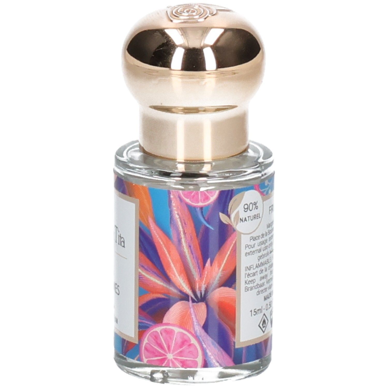 Parfümflakon mit goldenem Verschluss und buntem Etikett mit Zitrusfrüchten und tropischen Blättern. Enthält 15ml.