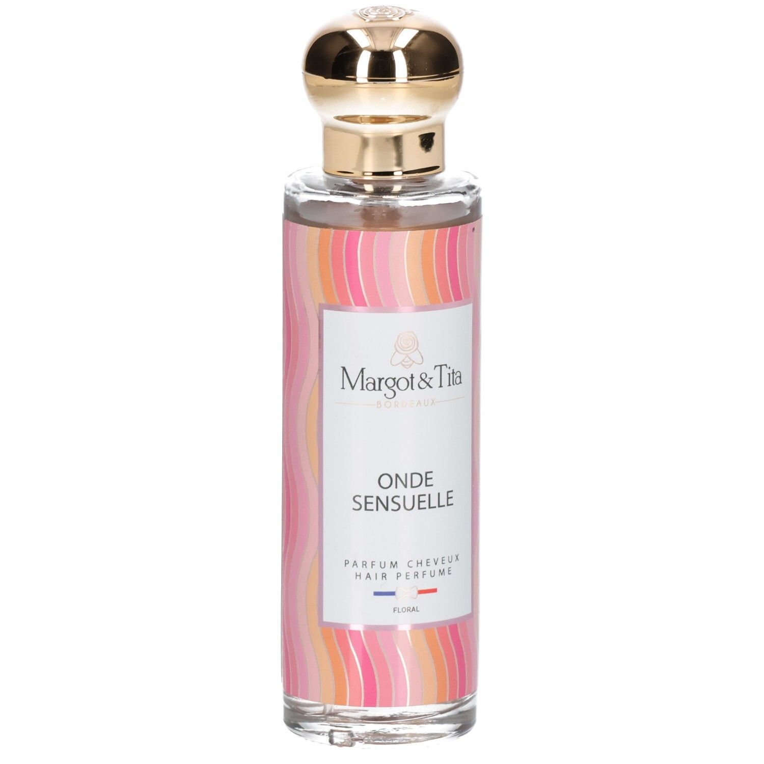 Parfümflasche mit goldfarbenem Verschluss. Aufschrift: Onde Sensuelle, Parfum Cheveux. Marke: Margot & Tita.