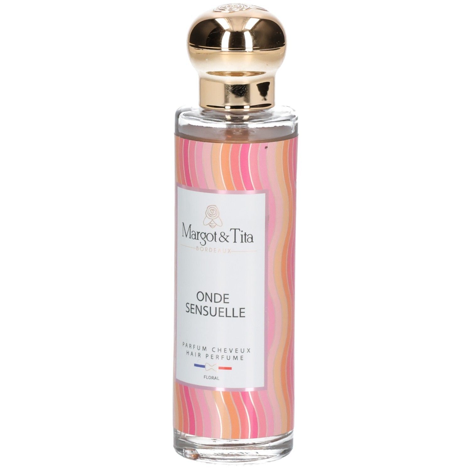 Parfümflasche mit goldfarbenem Verschluss. Aufschrift: Onde Sensuelle, Parfum Cheveux. Marke: Margot & Tita.