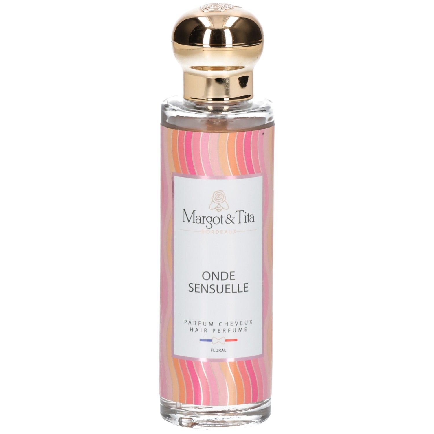 Parfümflasche mit goldfarbenem Verschluss. Aufschrift: Onde Sensuelle, Parfum Cheveux. Marke: Margot & Tita.