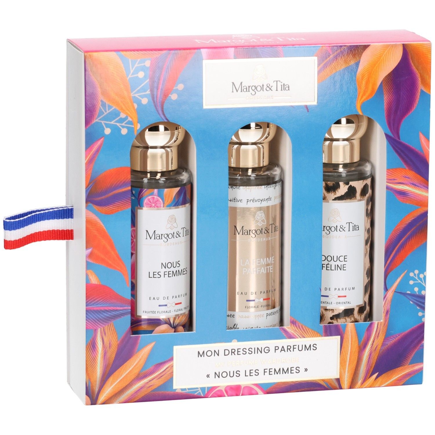 Coffret cadeau Margot & Tita avec trois flacons de parfum, légèrement ouvert.