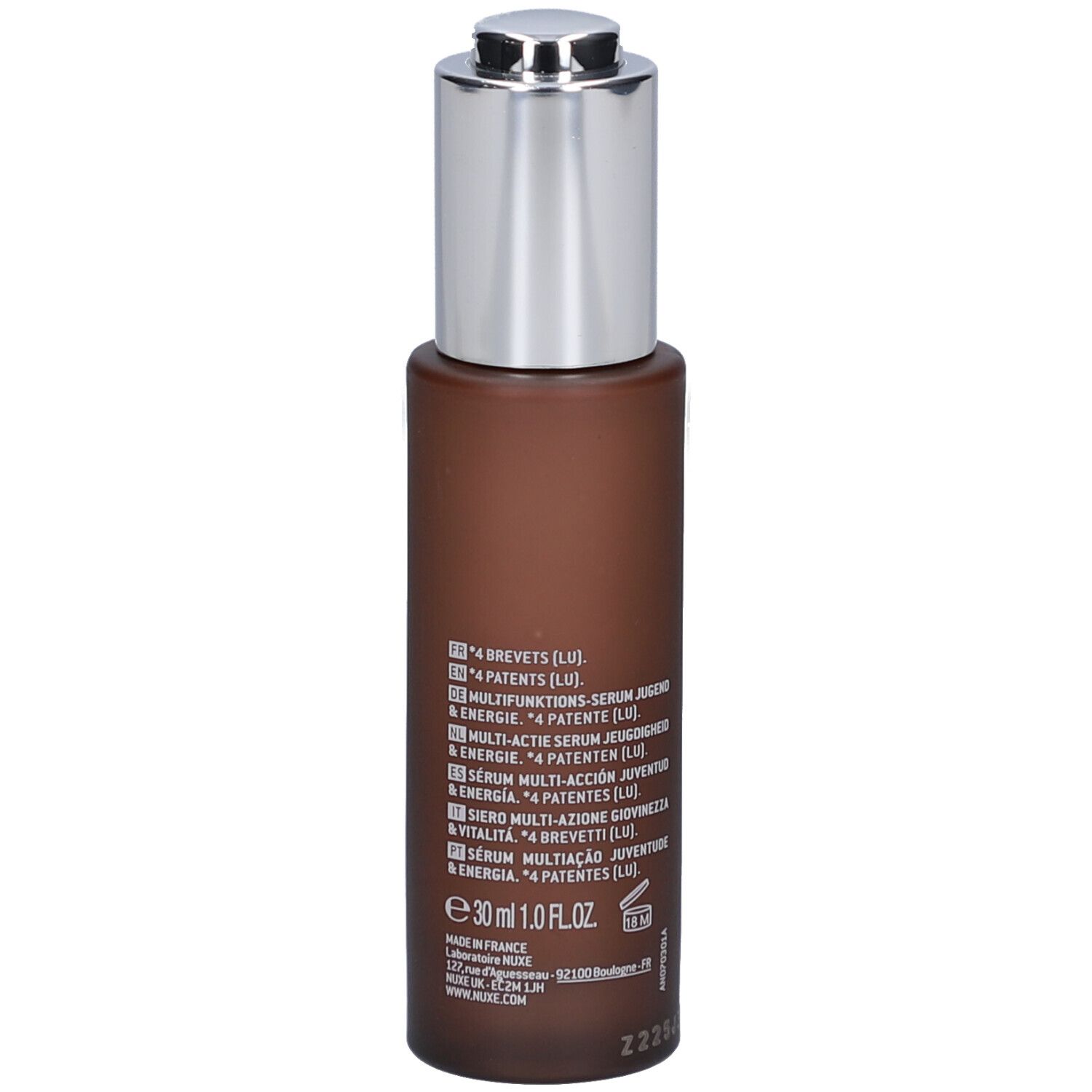 Braune Flasche mit silbernem Verschluss. Aufschrift: Nuxe, men | BOOST, Sérum Multi-Actions Jeunesse & Energie, 30 ml.