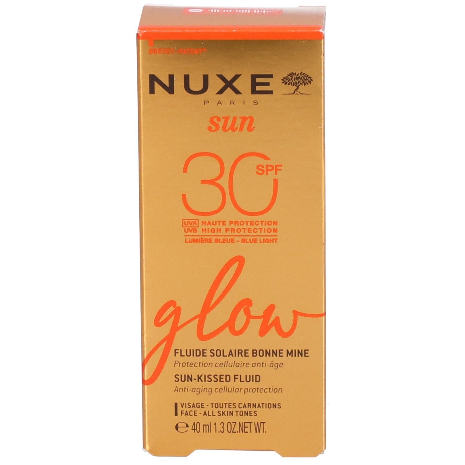Kartonverpackung. Nuxe Sun SPF30 Glow. Orangefarbenes Design mit Produktinformationen.