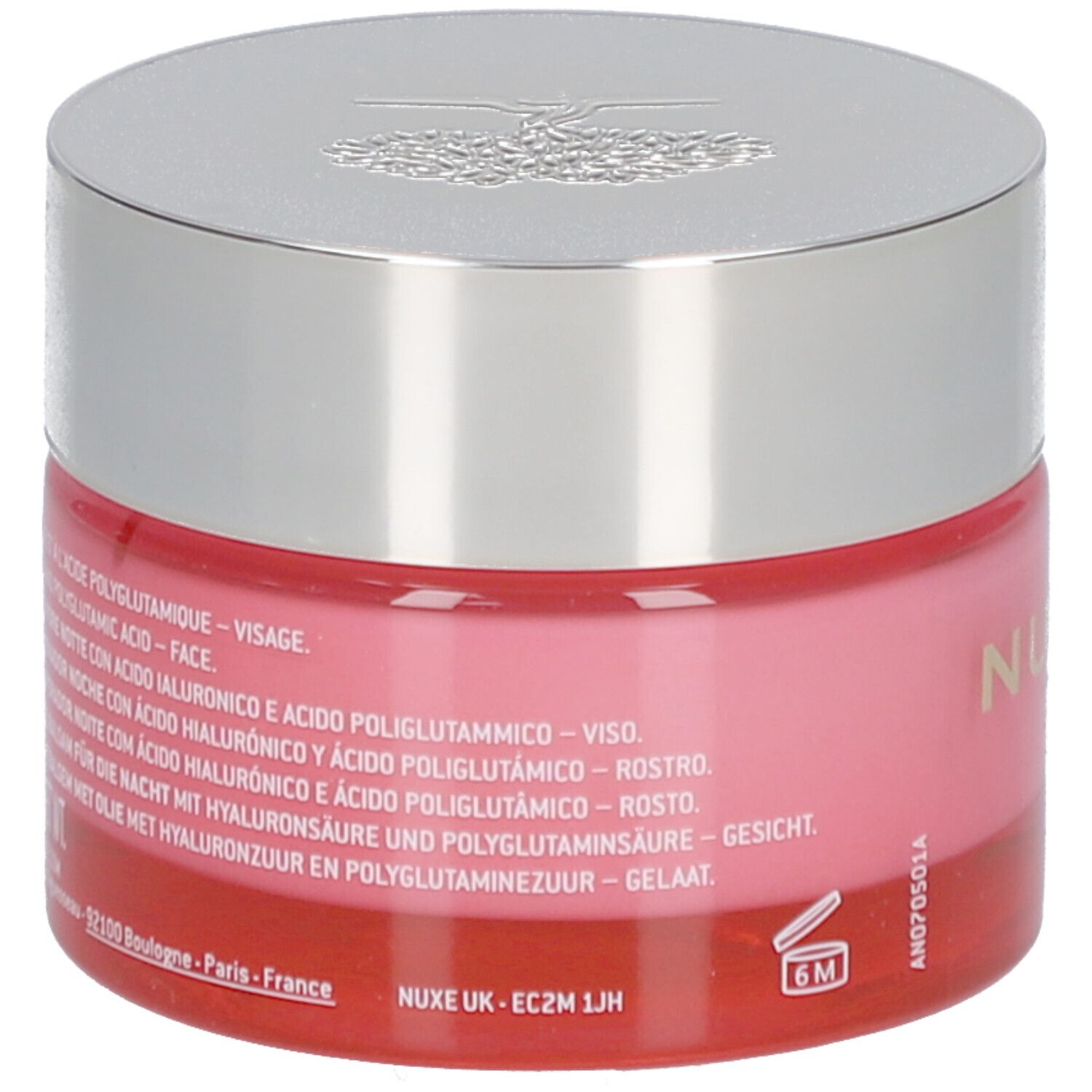 Rosa Tiegel mit silbernem Deckel. Aufschrift: Nuxe, sowie Text in mehreren Sprachen. 6M-Symbol.