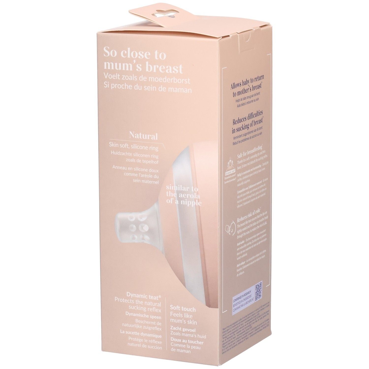 Verpackung mit Babyflasche. Rosa und weiß. Detailansicht der Flaschenspitze.