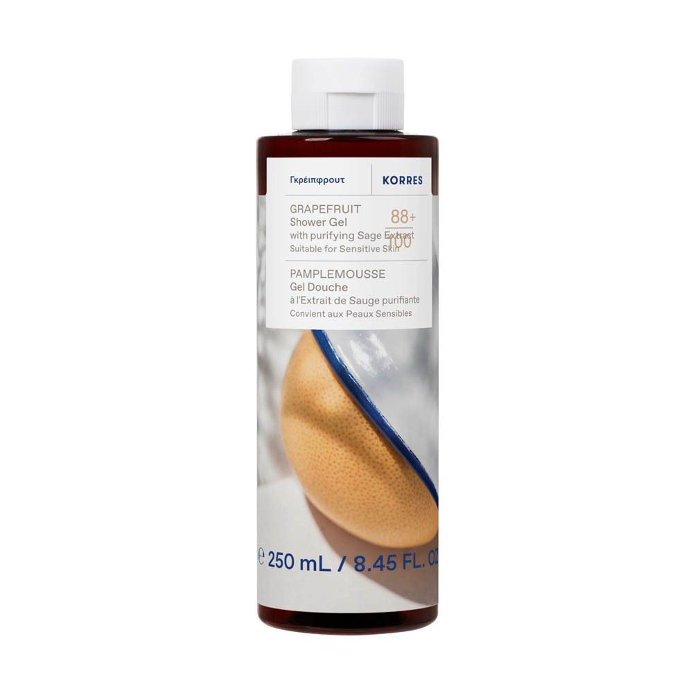 Flacon marron avec bouchon blanc. Étiquette avec informations produit et image de pamplemousse. Marque Korres.