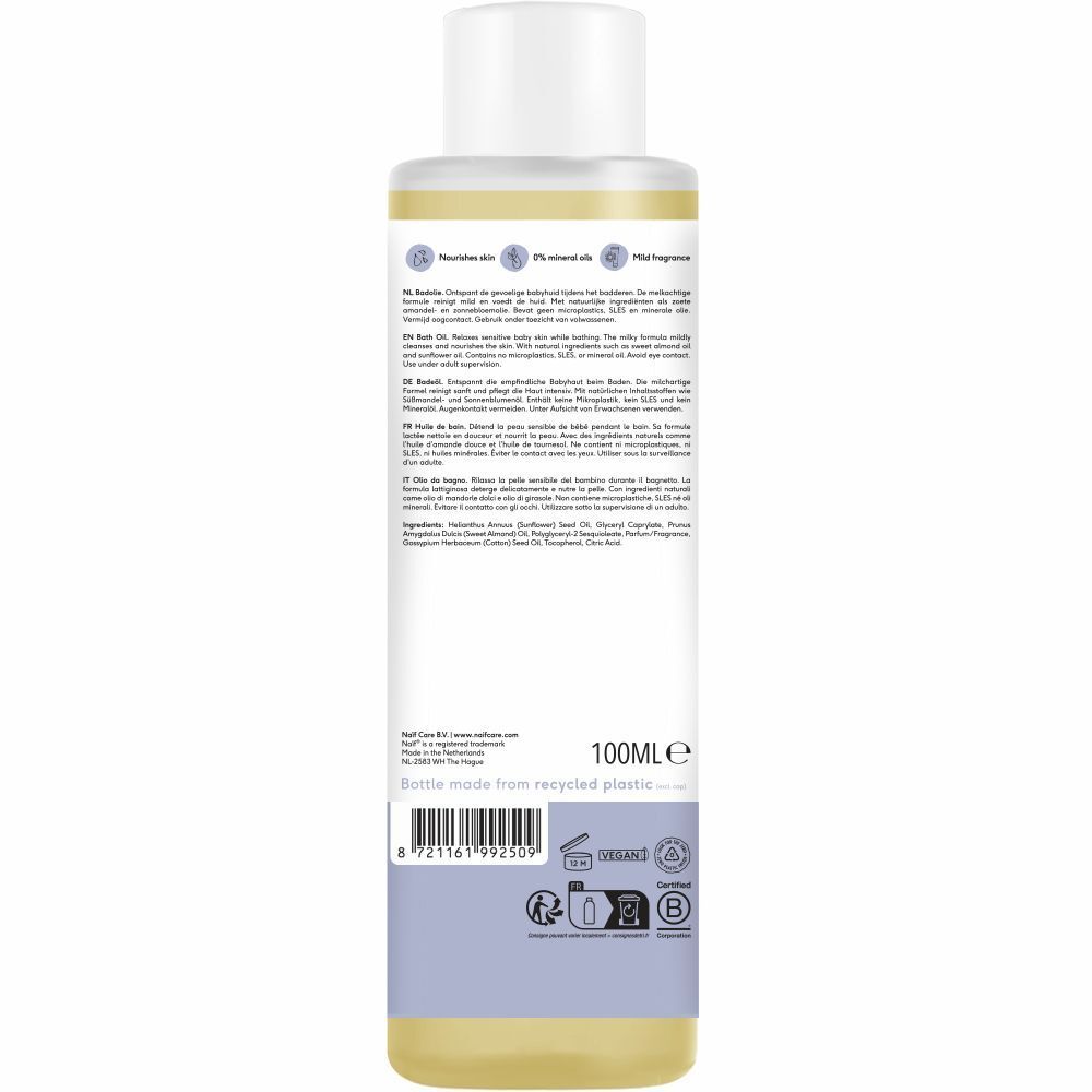 Dos du flacon d'huile de bain Naïf. Contient 100 ml. Avec certifications et ingrédients. Fabriqué à partir de plastique recyclé.