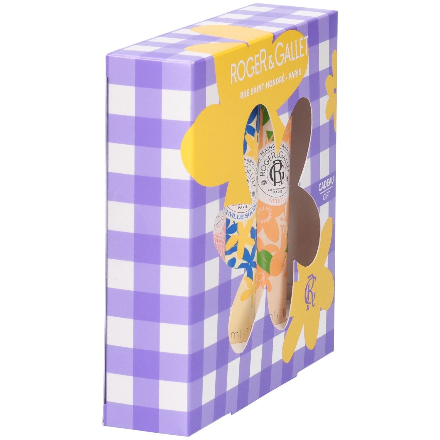 Geschenkbox mit drei Handcremes. Lila kariertes Muster, gelbe Blüten-Ausschnitte. Roger&Gallet Logo sichtbar.