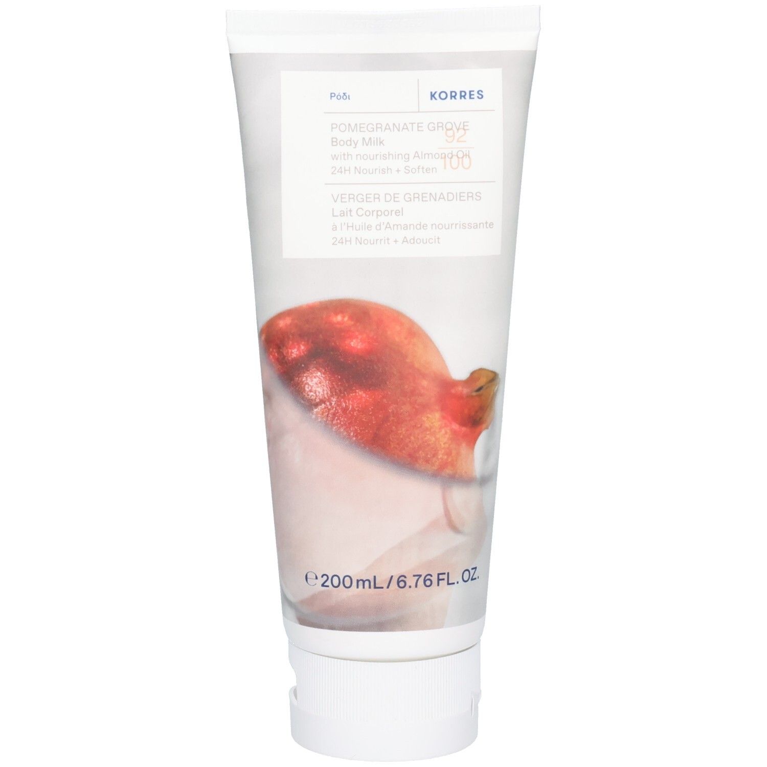 Weiße Tube mit Korres Pomegranate Grove Body Milk Aufschrift und Granatapfel-Illustration.
