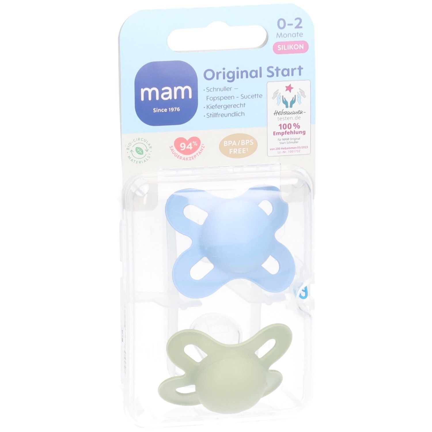 Zwei Schnuller in Blisterverpackung. Blauer und grüner Schnuller. Verpackung mit Produktnamen und Logo.