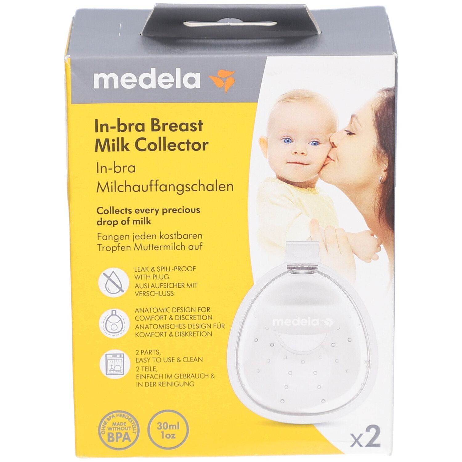 Medela In-bra Milchauffangschalen Verpackung. Zwei transparente Auffangschalen. Logo und Produktinformationen.