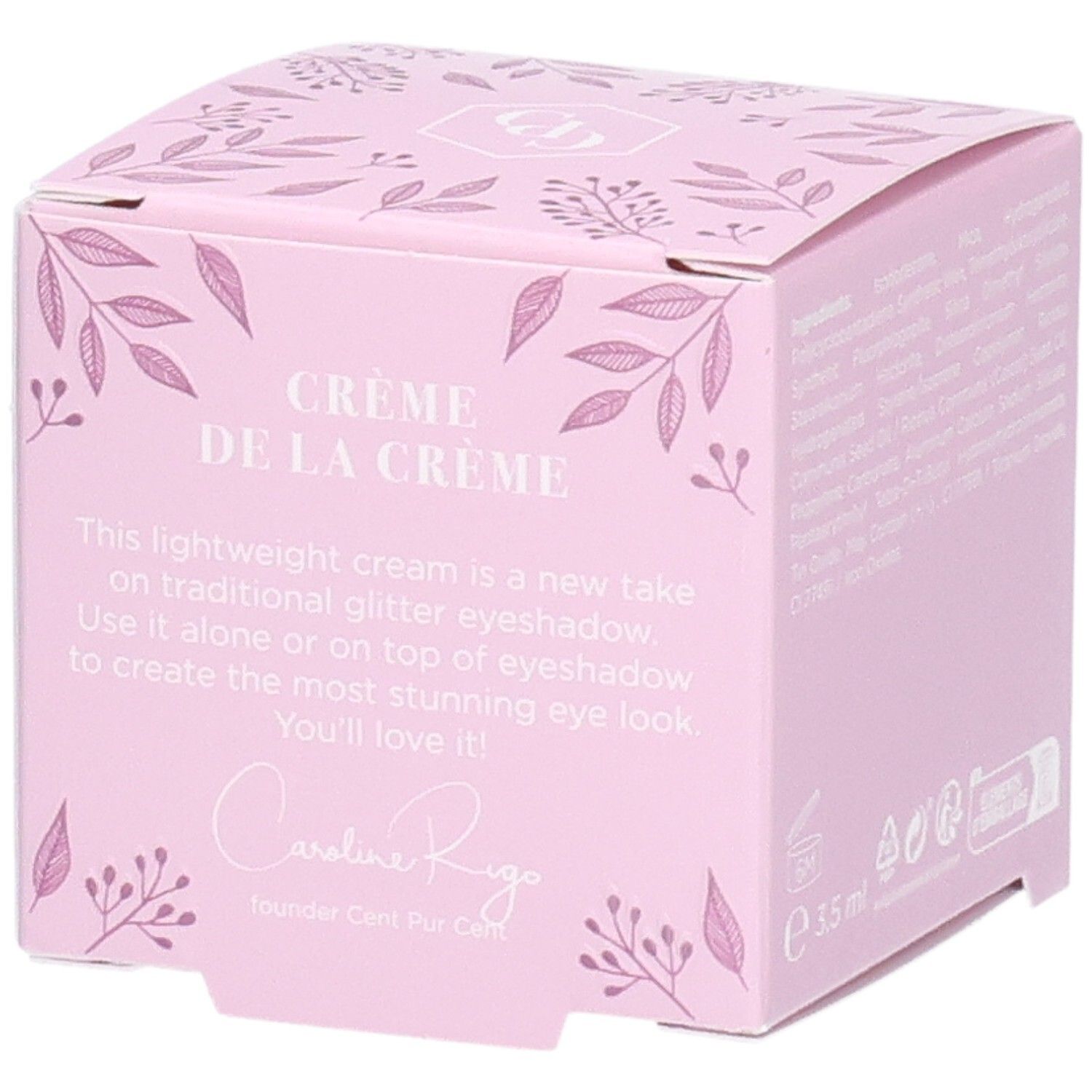 Rosa Verpackung mit Text: Crème de la Crème. Text: This lightweight cream is a new take on traditional glitter eyeshadow. Caroline Rigo.
