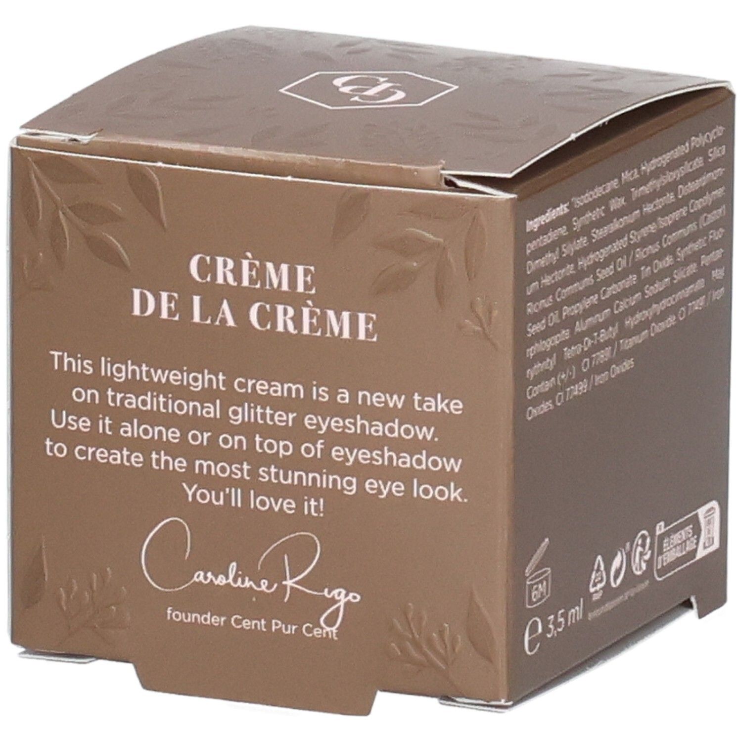 Boîte marron avec texte. Texte : Crème de la Crème, Cent Pur Cent. Signature : Caroline Rigo. Volume : 3,5 ml.