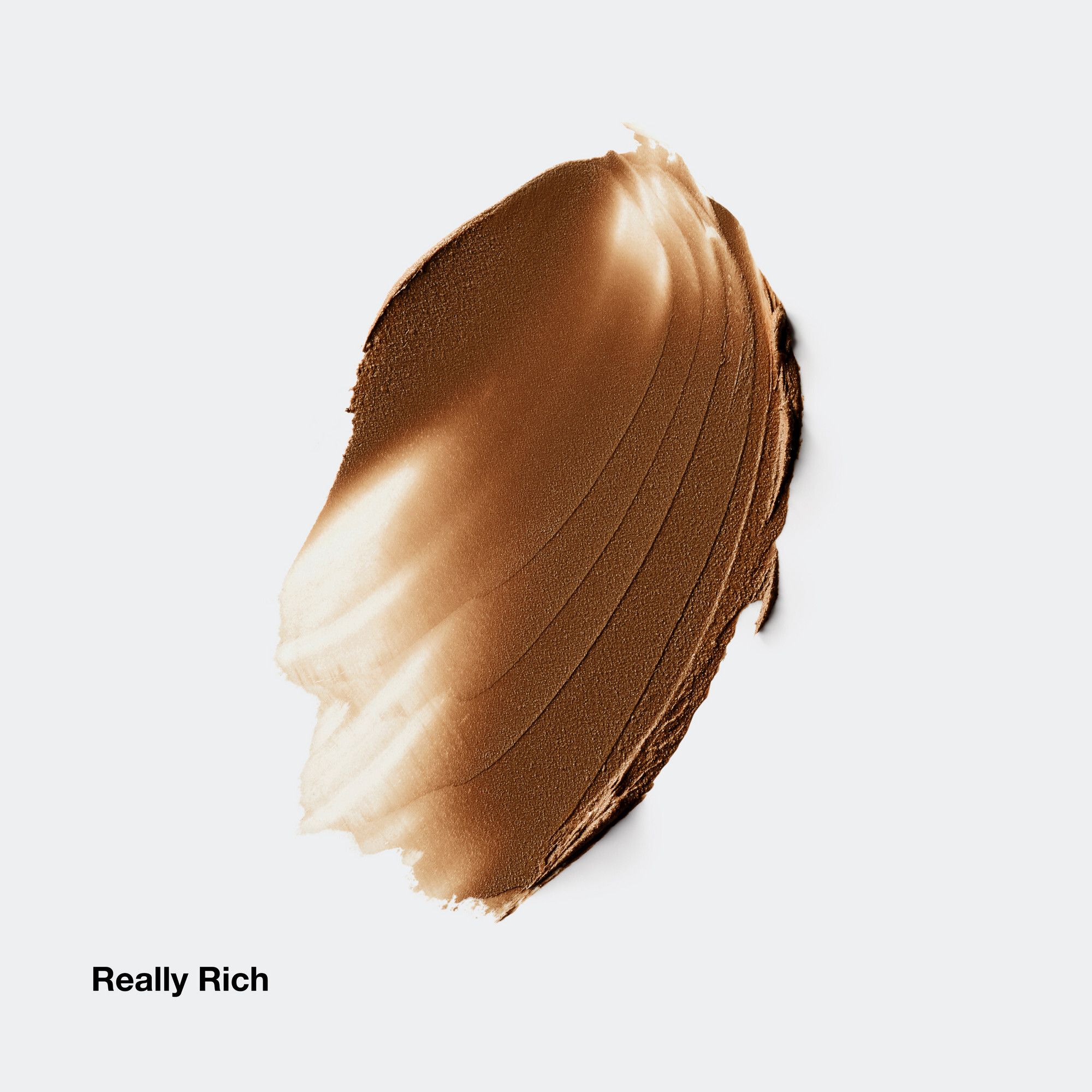 Nuance brune de Clinique Chubby Stick. Nom du produit et teinte 'Really Rich' visibles.