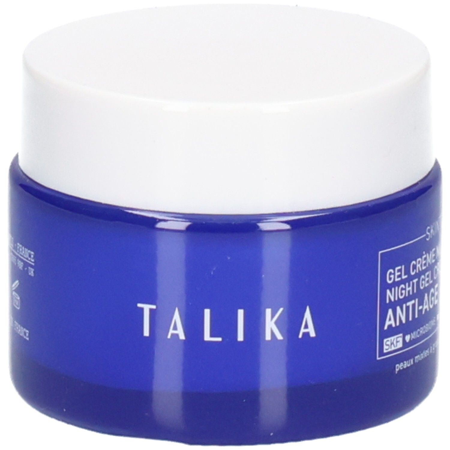 Talika Anti-Age Nacht Gel-Creme. Blaue Glasdose mit weißem Deckel. Marke 'TALIKA' auf dem Glas.