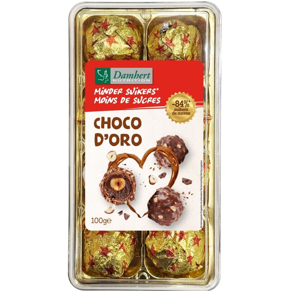 Chocolats fourrés aux noisettes, emballés dans du papier doré orné d'étoiles rouges.
