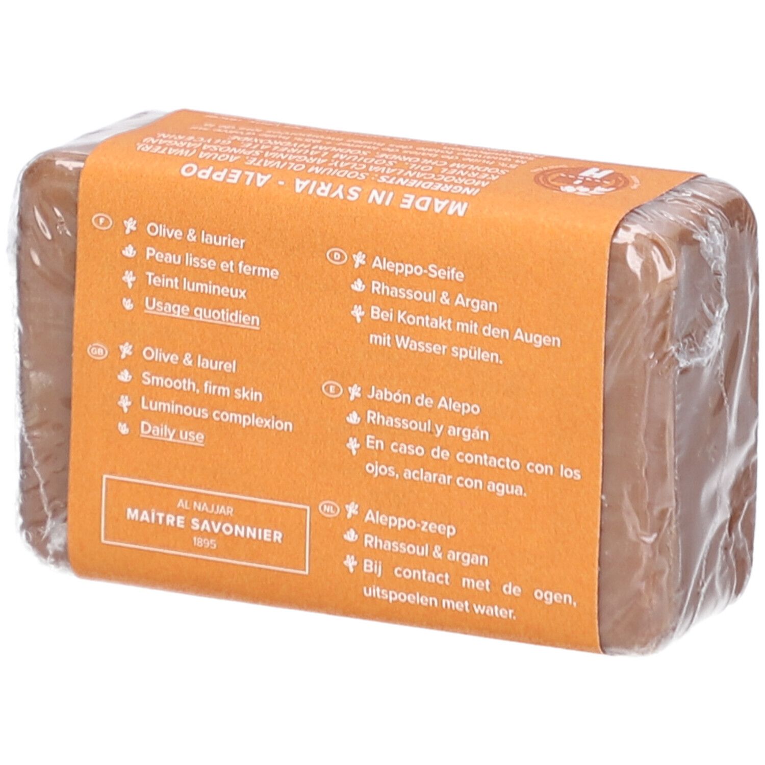 Rechteckige Seife in Folie. Rückseite mit Text in mehreren Sprachen.