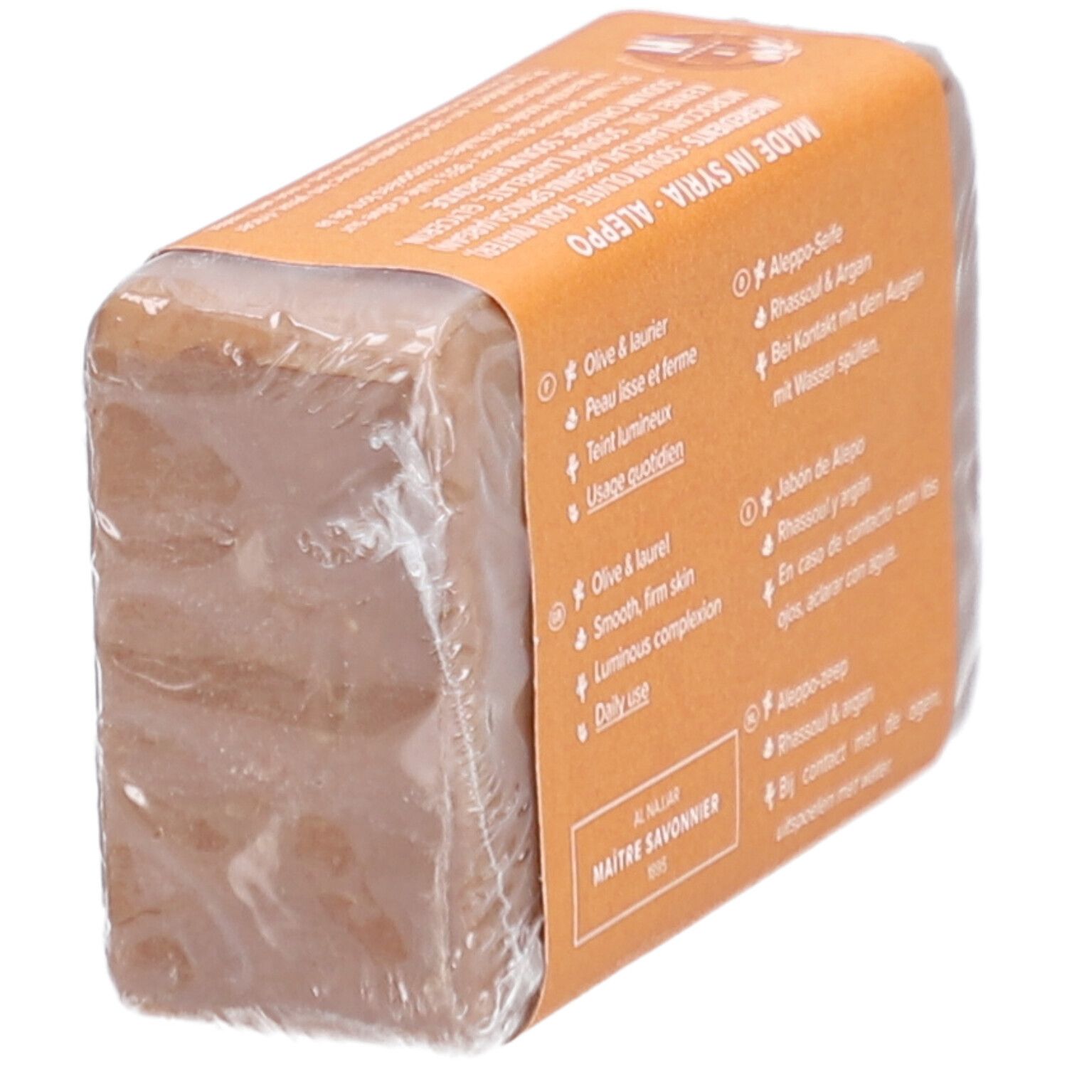 Rechteckige Seife in Folie. Rückseite mit Text in mehreren Sprachen.