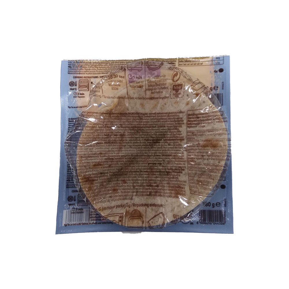 Runde Flatbreads in transparenter Verpackung. Rückseite der Verpackung mit Text.