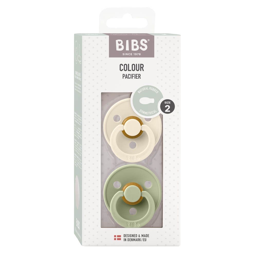 Boîte de deux sucettes BIBS, coloris Sage/Ivory, taille 2. Fenêtre transparente. Design danois.
