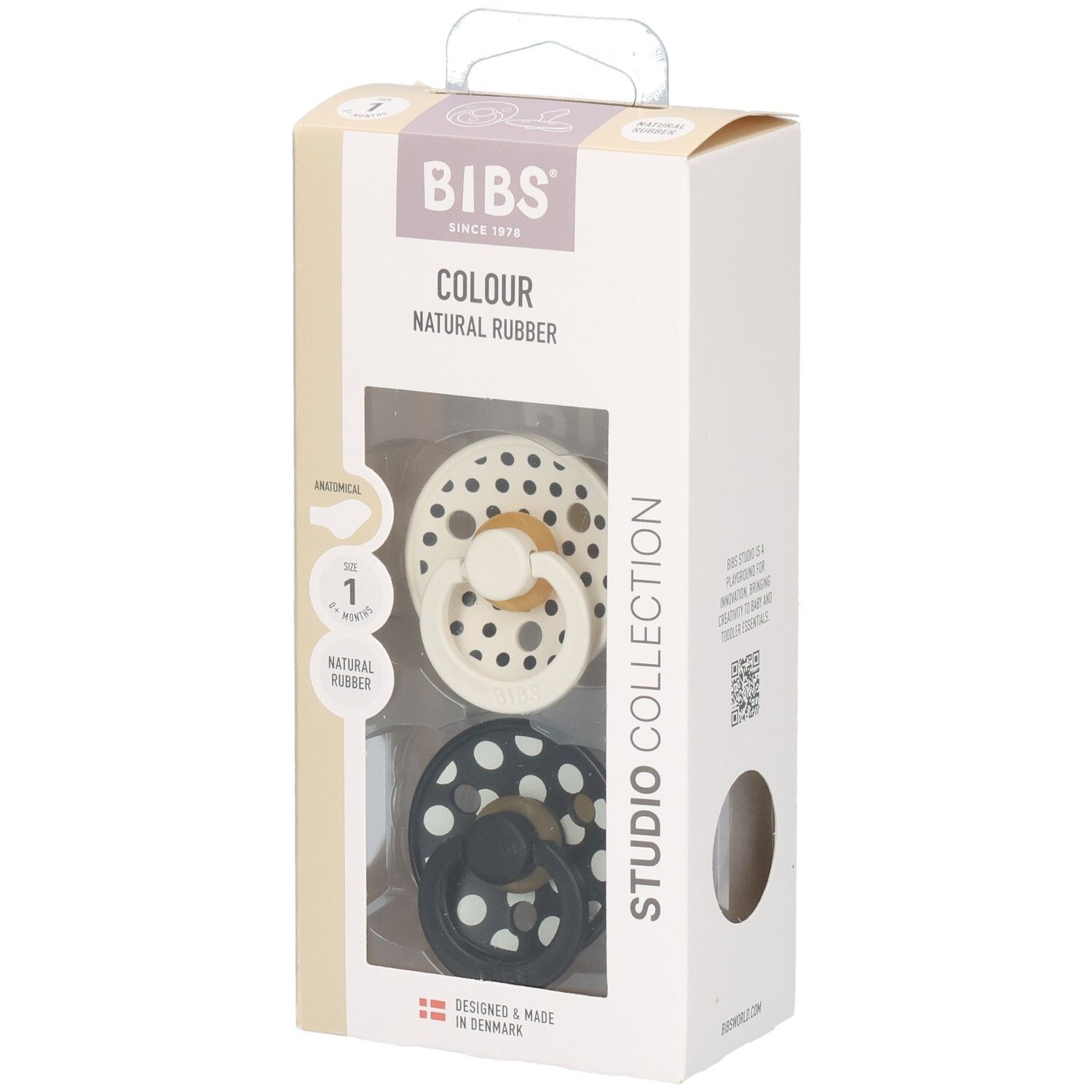 Verpackung mit zwei Schnullern. Marke BIBS. Polka-Dot-Design. Anatomischer Sauger. Naturkautschuk. Farbe: Schwarz und Creme.
