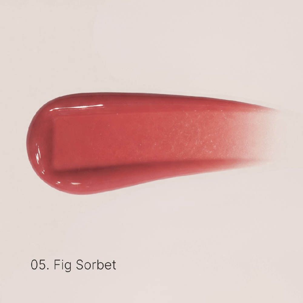 Ein korallenroter Lippenstift-Swatch mit glänzendem Finish, der nach rechts verläuft und verblasst.