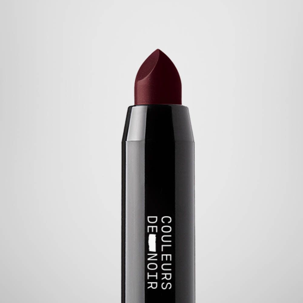 Dunkelroter Lippenstift in schwarzer Hülse mit Aufschrift 'COULEURS DE NOIR'.