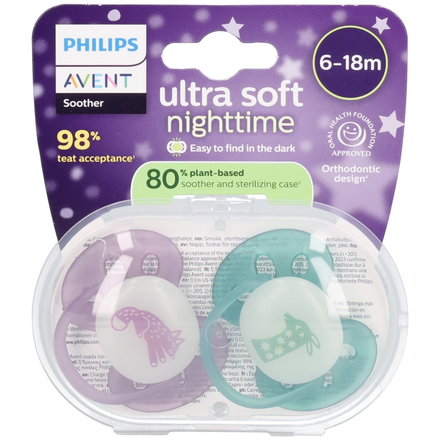 Zwei Schnuller in einer transparenten Hülle. Lila und türkise Schnuller mit leuchtenden Elementen. Verpackung mit Produktinformationen.