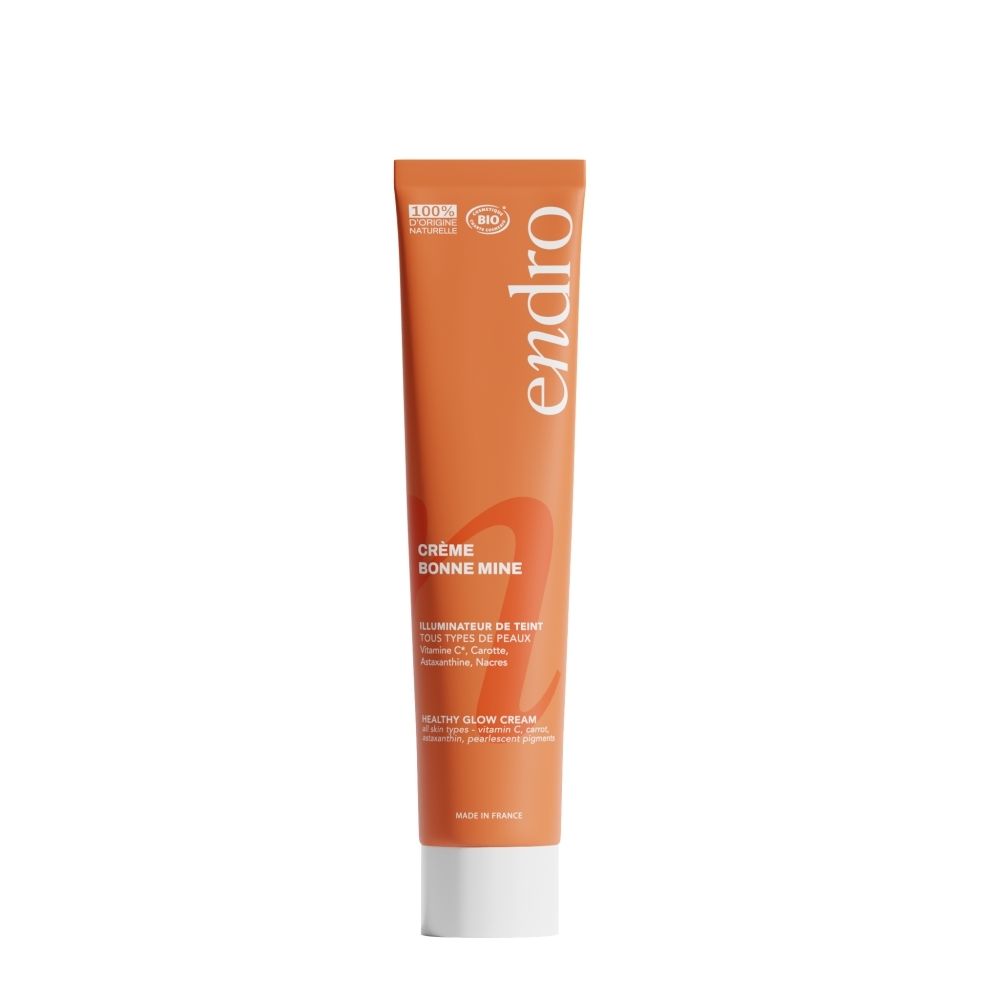 Tube orange avec logo "endro", inscription "Crème Bonne Mine" et "Healthy Glow Cream". "Made in France" visible.