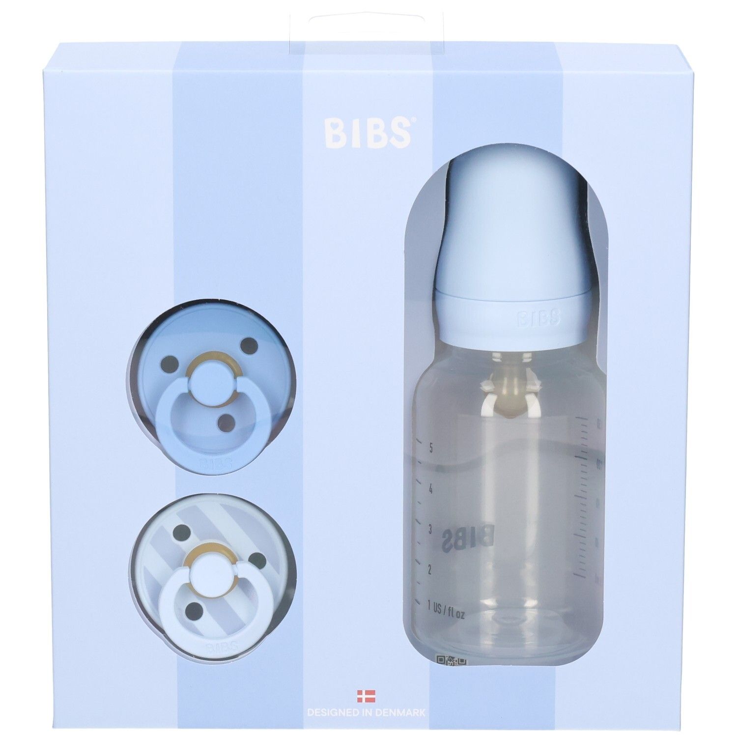 Coffret cadeau bleu avec biberon et sucettes. Marque BIBS. Emballage avec fenêtre.