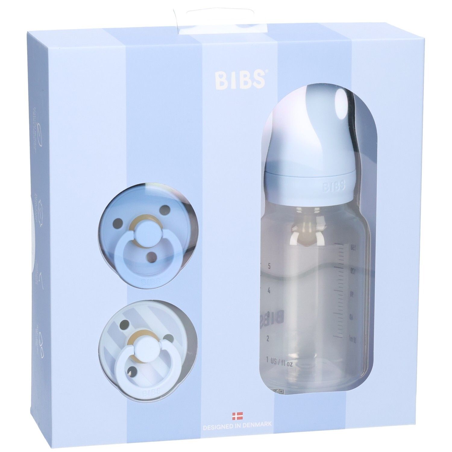 Coffret cadeau bleu avec biberon et sucettes. Marque BIBS. Emballage avec fenêtre.