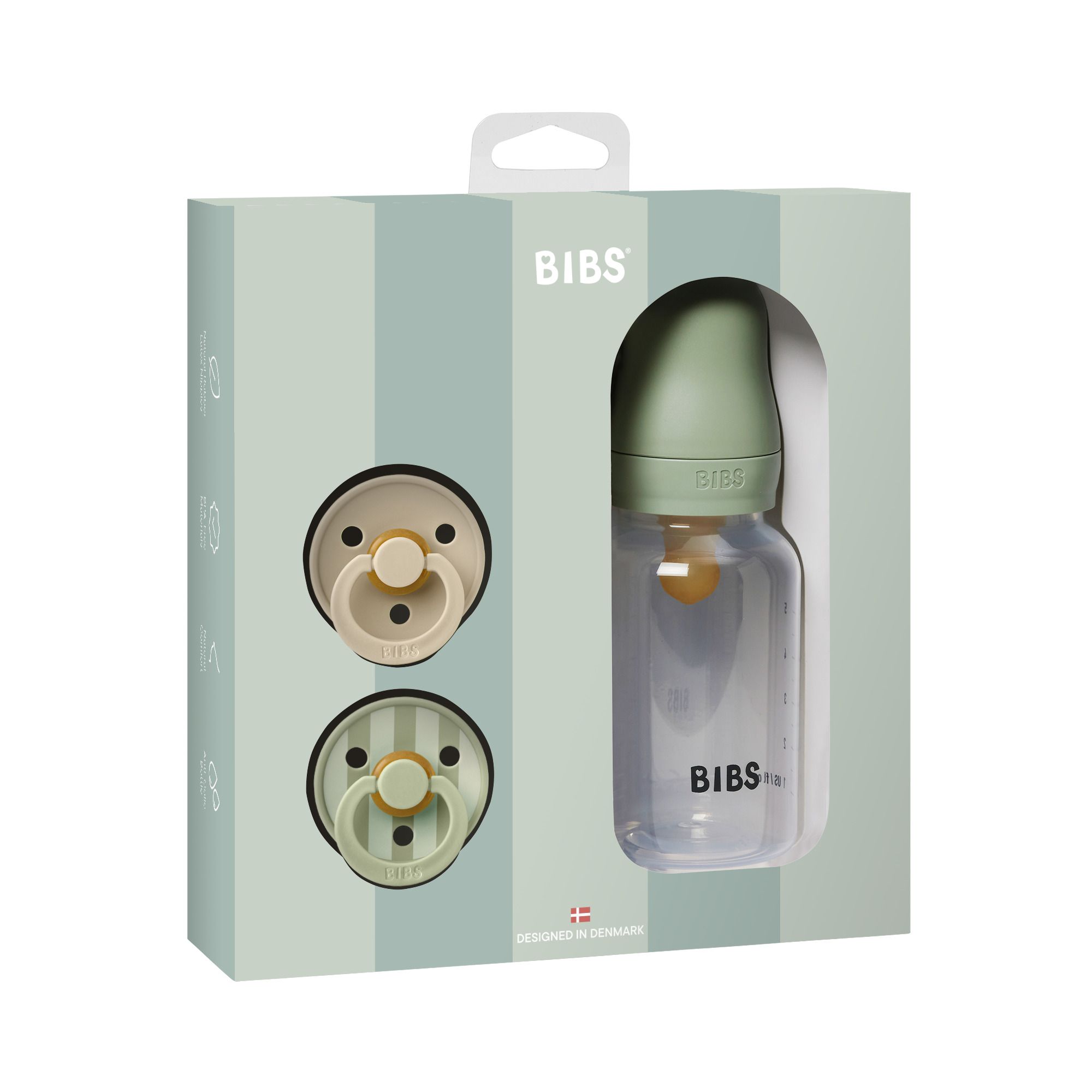 Coffret cadeau avec deux sucettes et un biberon. La bouteille et les sucettes sont visibles.