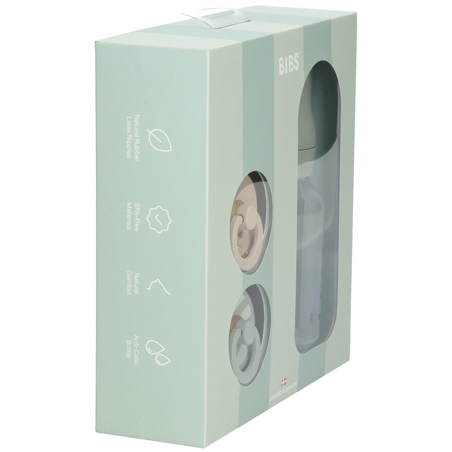 Vue latérale du coffret cadeau avec caractéristiques du produit et nom de la marque. Contient deux sucettes et une bouteille.